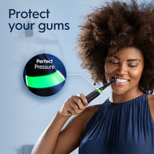Woman using an electric toothbrush with a label on 'Perfect Pressure'.